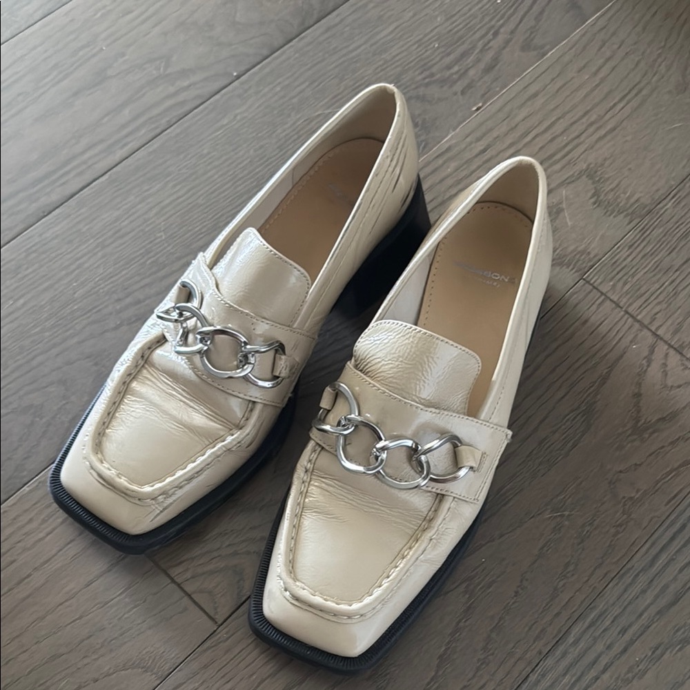 Vagabond Cream Loafers with Chain Detail